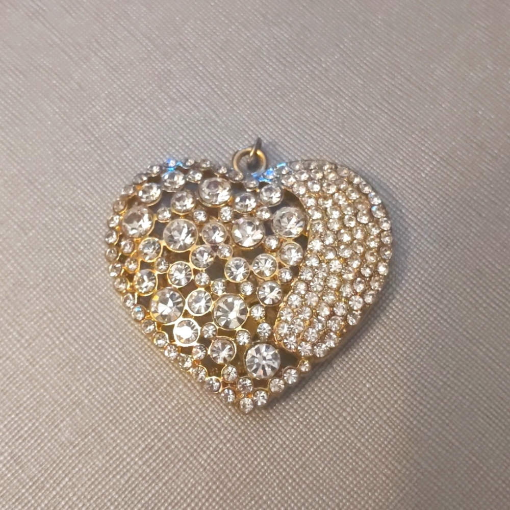 Large gold charm with CZ's